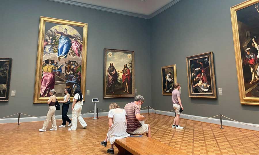 People admiring the gallery in the Painting and Sculpture of Europe section