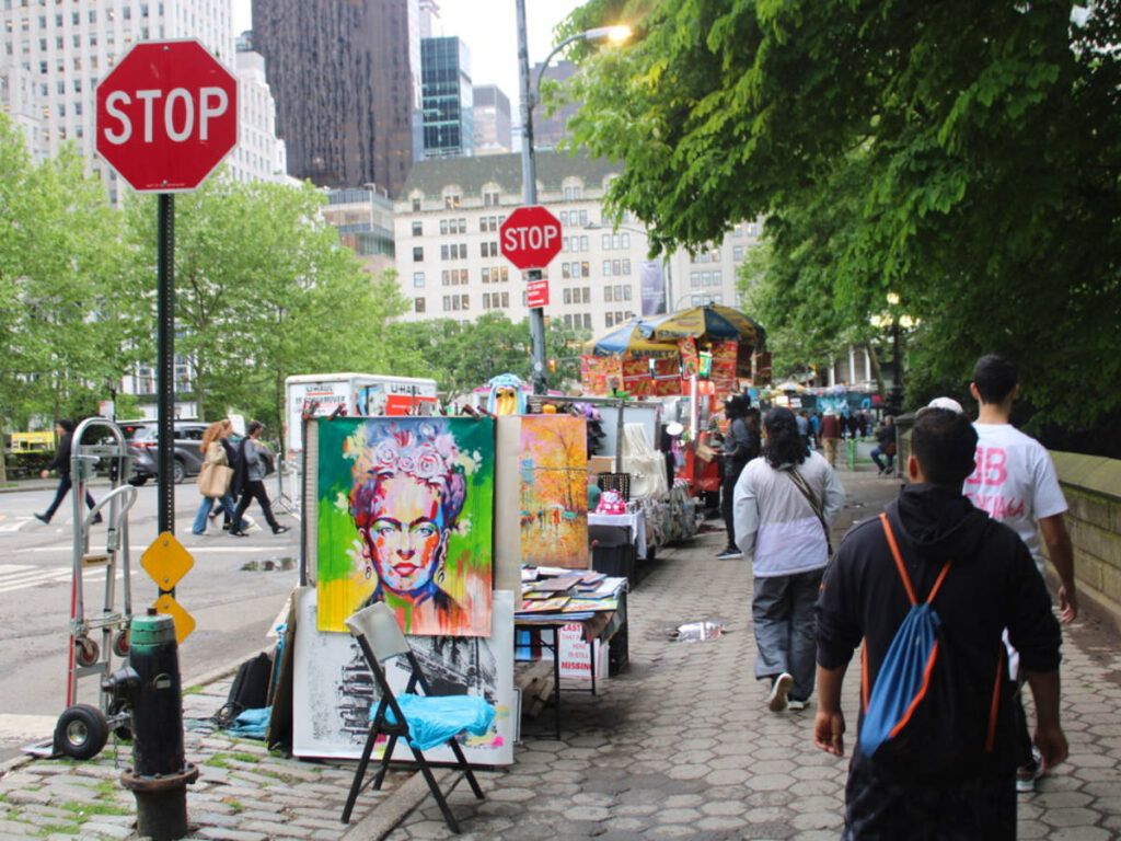 Artists selling artwork on the street near Central Park