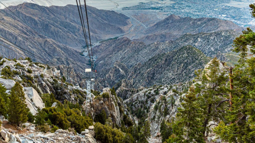 Aerial view of the Palm Springs Aerial Tramway in the middle of mountain ranges