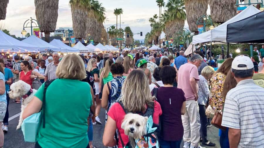A busy night market in Palm Springs Villagefest during peak season