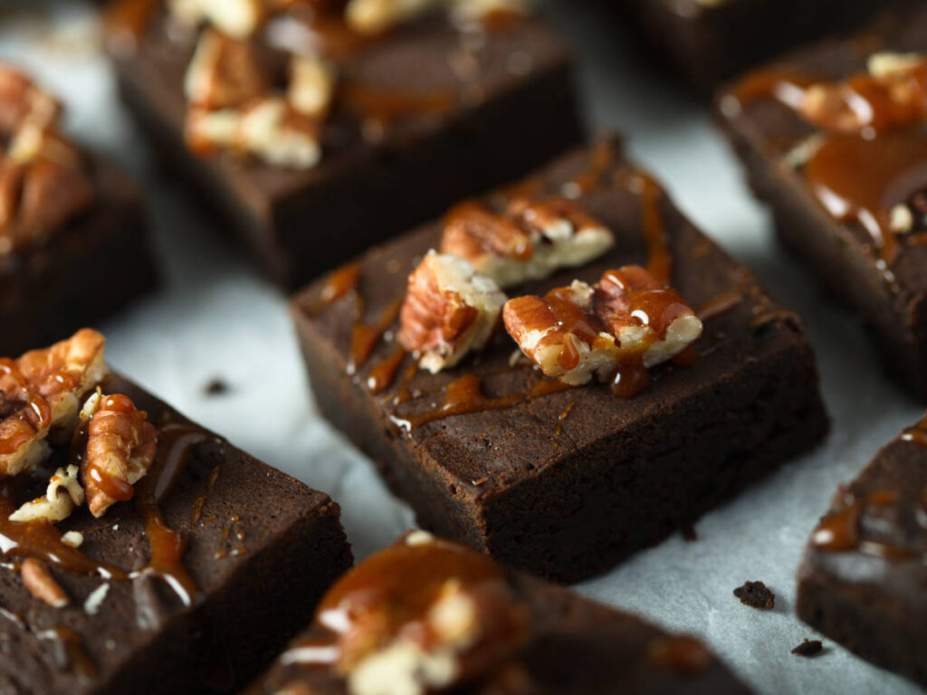 Close up view of a Palmer House brownies topped with walnuts