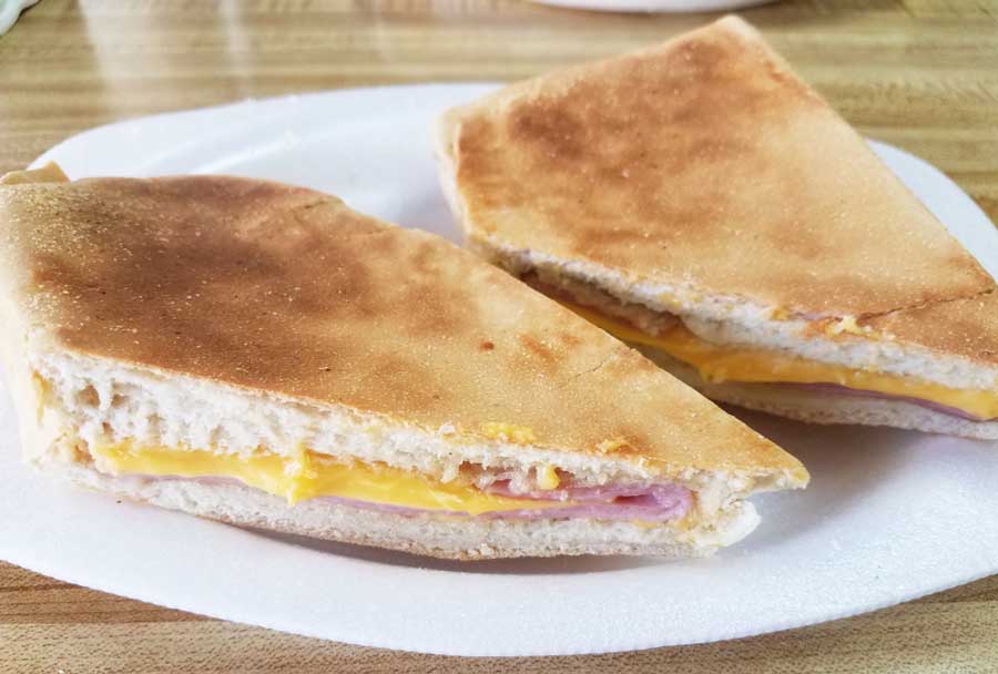Two slices of Pan Sobao on a plate