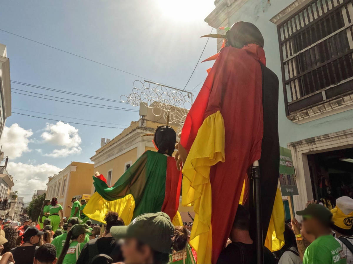 View of the crowd at the parade with vejigantes