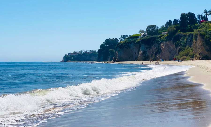 The Paradise Cove Beach under the clear blue sky