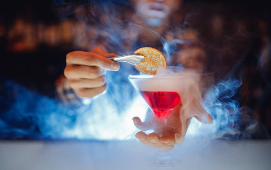 A bartender preparing a cocktail at the Paradiso