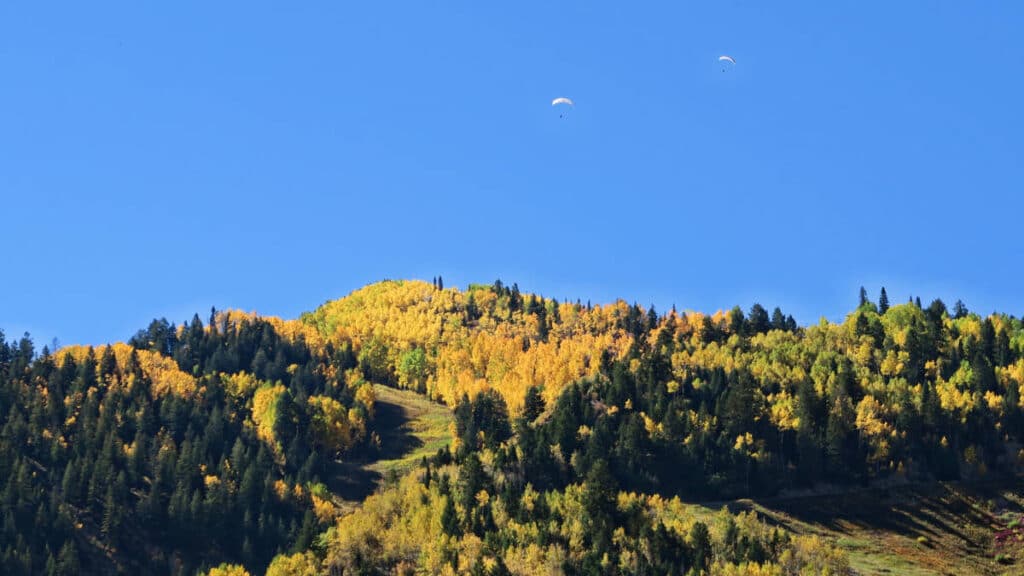 View of paragliders from afar in Aspen, Colorado