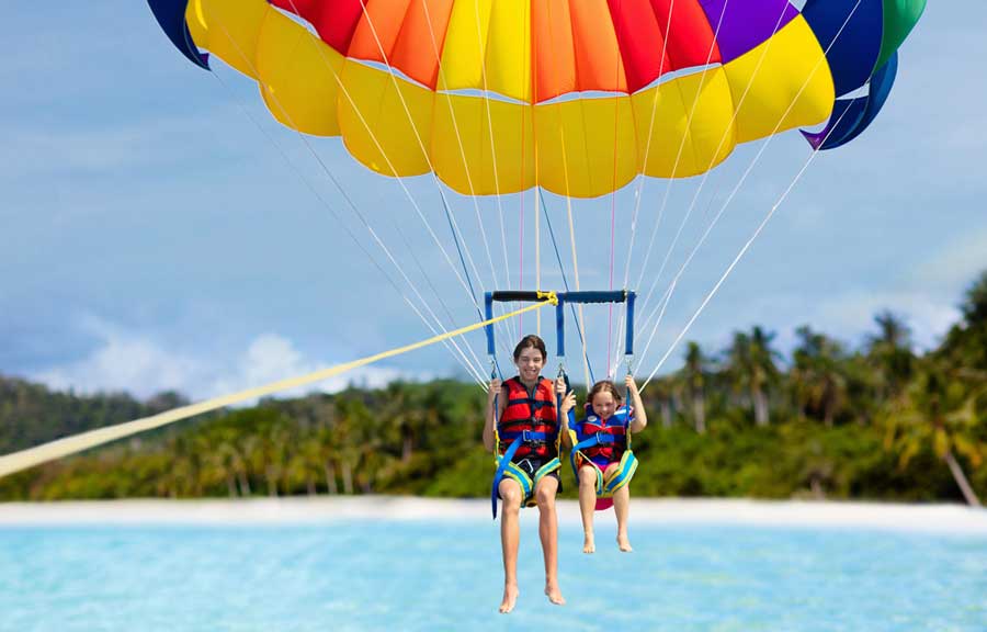 A man with his sister parasailing in St. Thomas