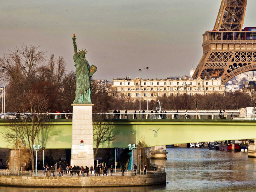 View of the main Statue of Liberty near the Eiffel Tower in Paris