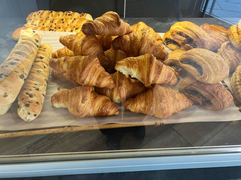 A variety of pastries on the display rack