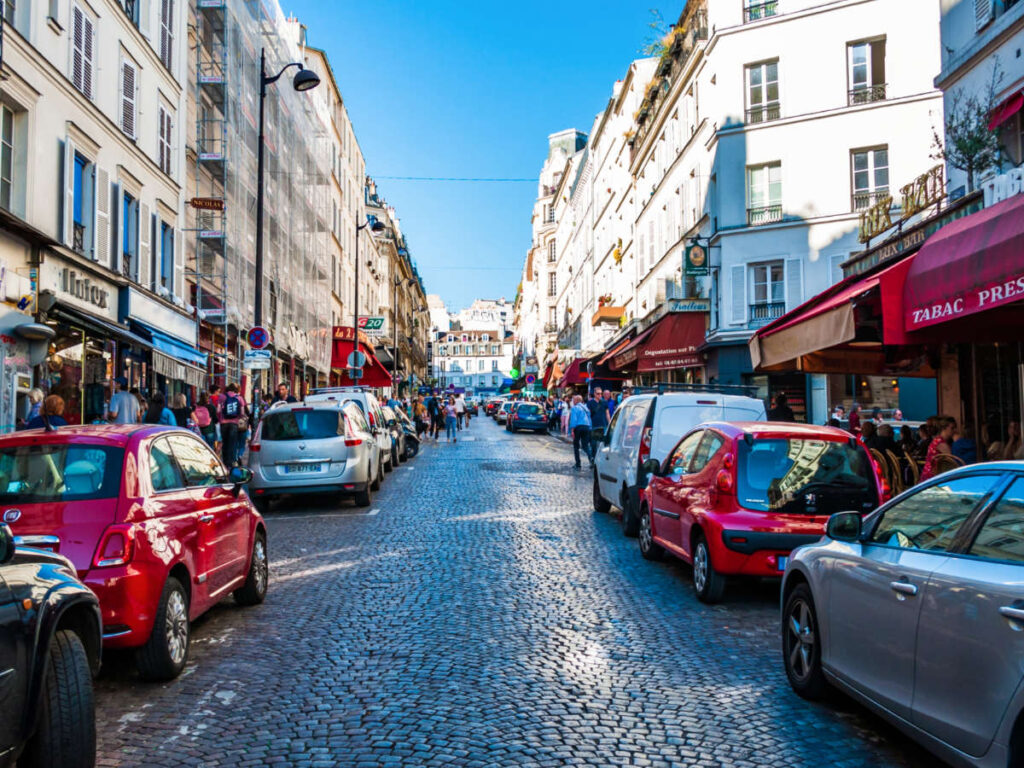 View of the cars parked on the side of the street in Paris