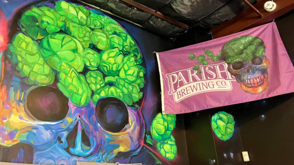 A colorful wall art inside the Parish Brewing Co