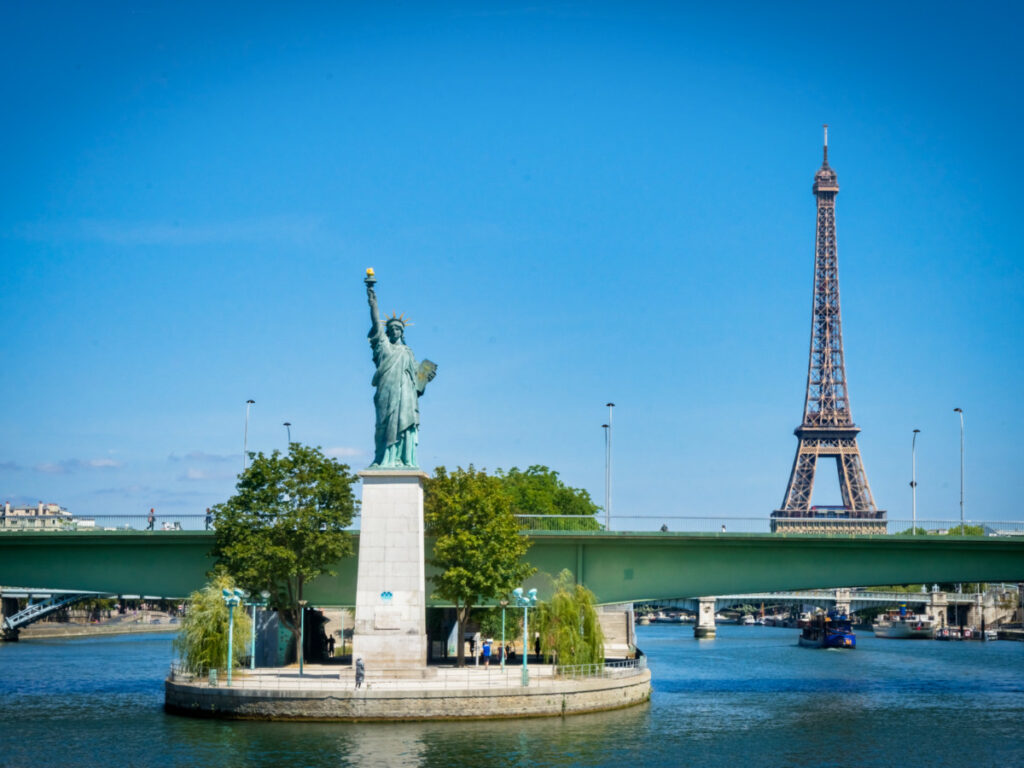 View of Paris's Statue of Liberty and the Eiffel Tower in the background