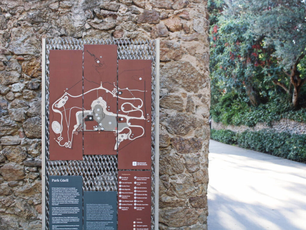 A map of the Park Güell displayed on a wall