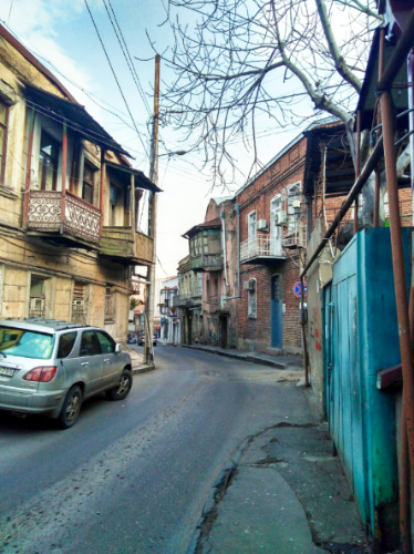 A parked car at the narrow street in Tbilisi
