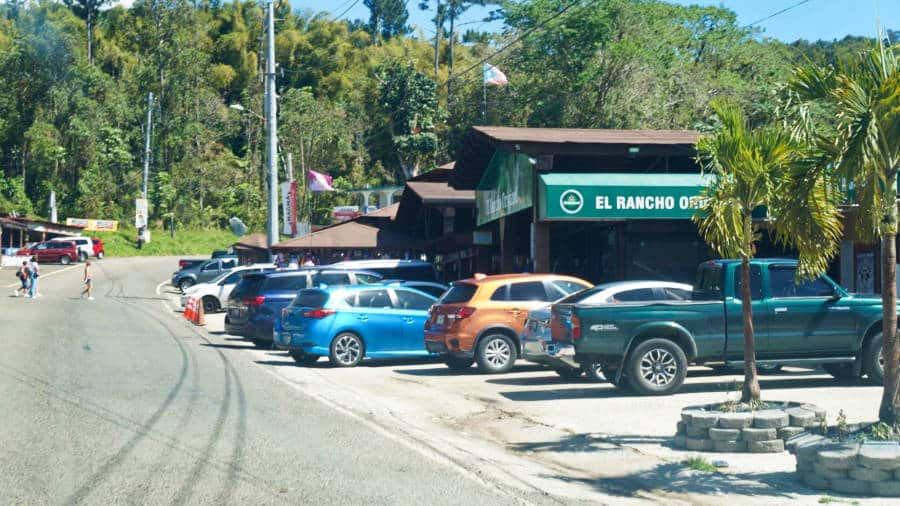 View of the parked cars outside a restaurant
