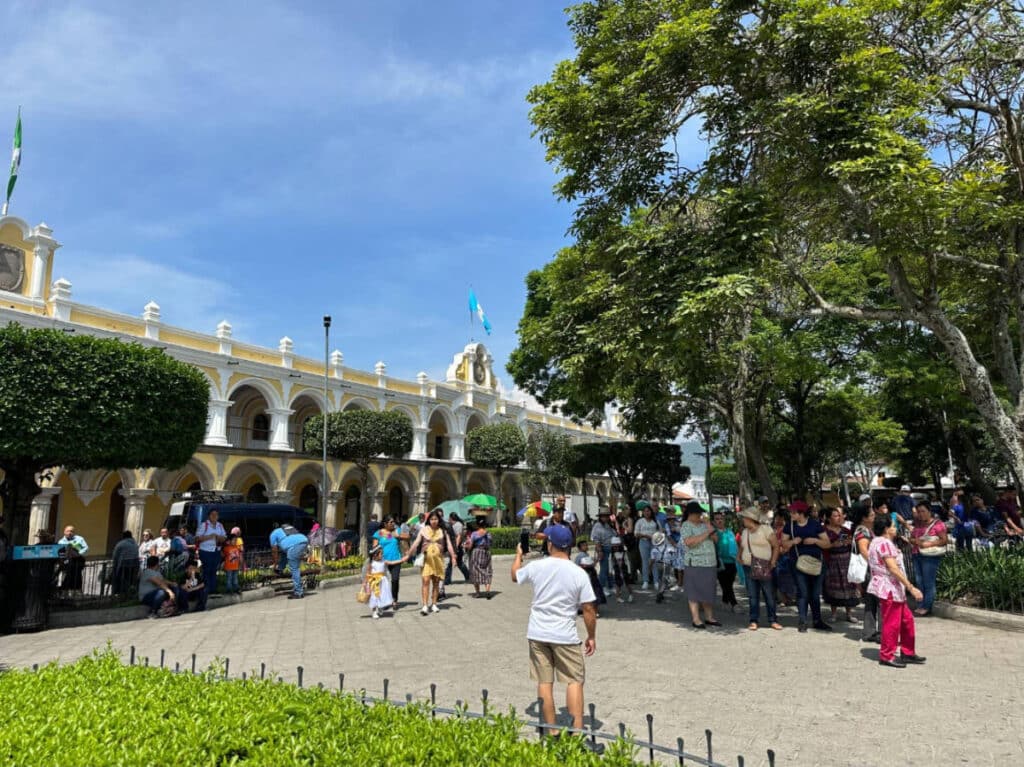People outside the Royal Palace of the Captains General building