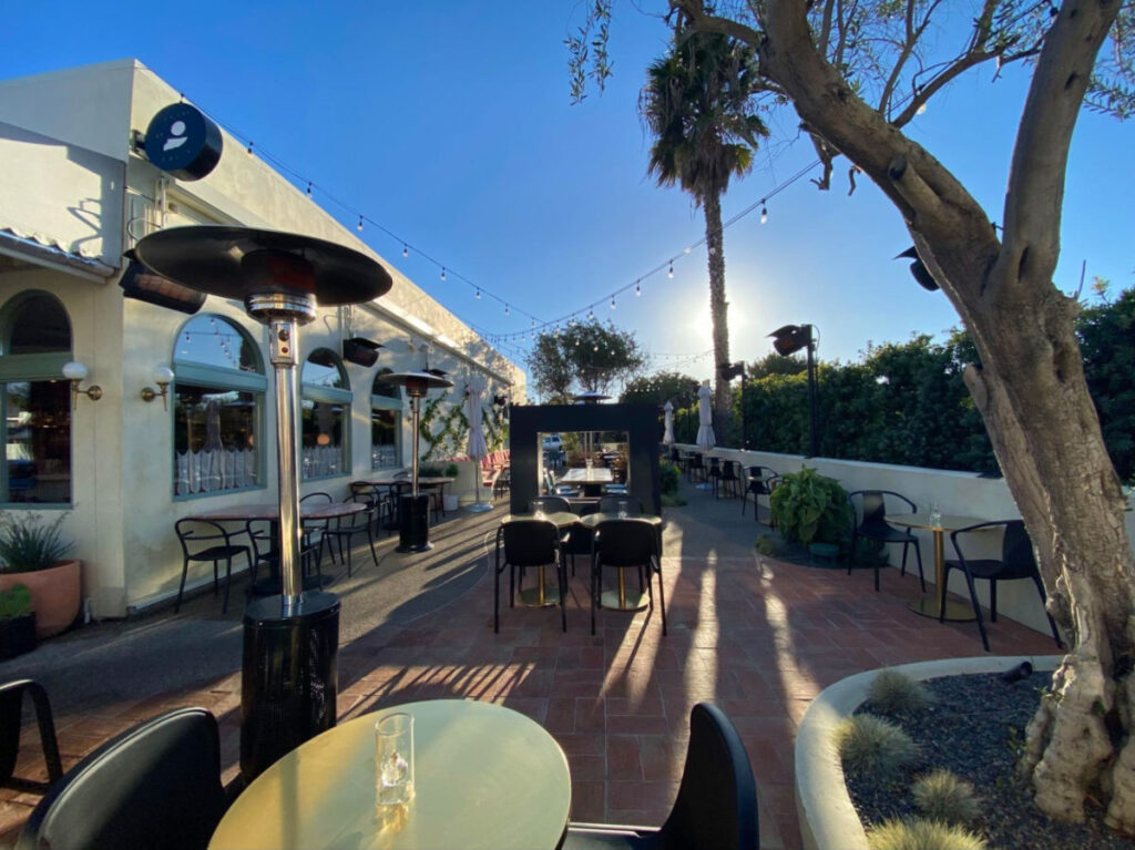 View of the outside patio at Jeune et Jolie during the day
