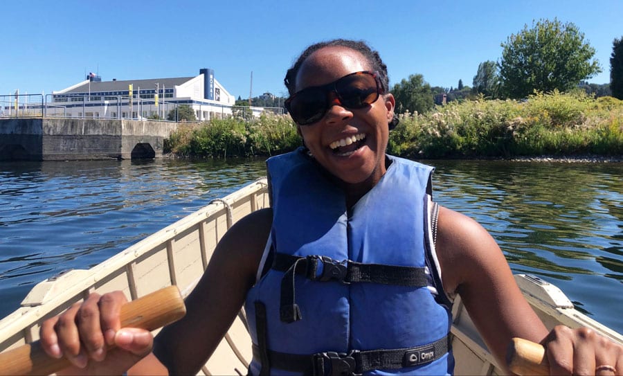 Author Chelsea smiling for a photo while riding a pea boat rentals