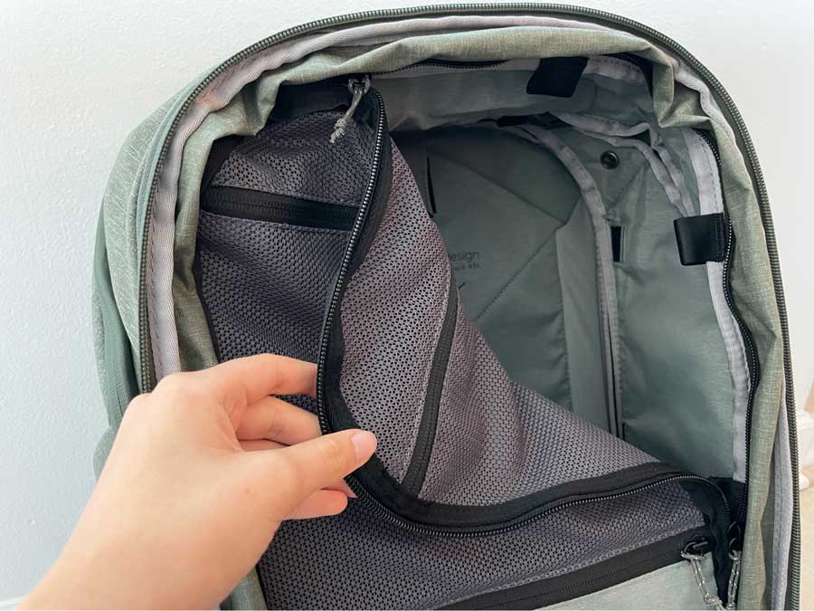 The zippered diving panel inside the Peak Design Travel Backpack