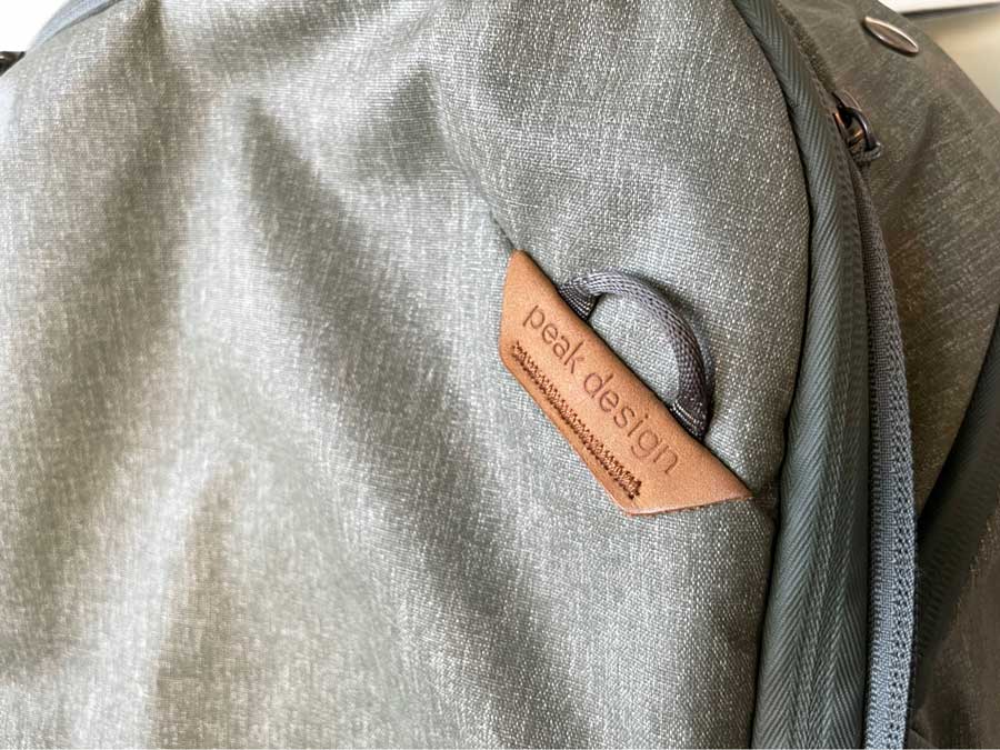 Close up view of the integrated loops of the Peak Design Travel Backpack