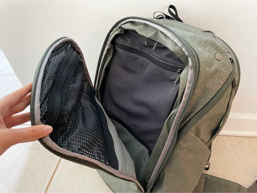 View from the inside of the zippered pocket compartment of the Peak Design Travel Backpack
