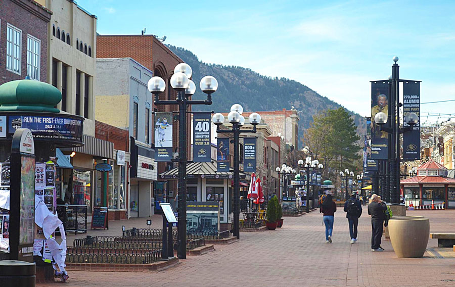 View of people walking in Pearl Street Mall