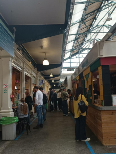 The crowd looking around the stalls at the Cardiff Market