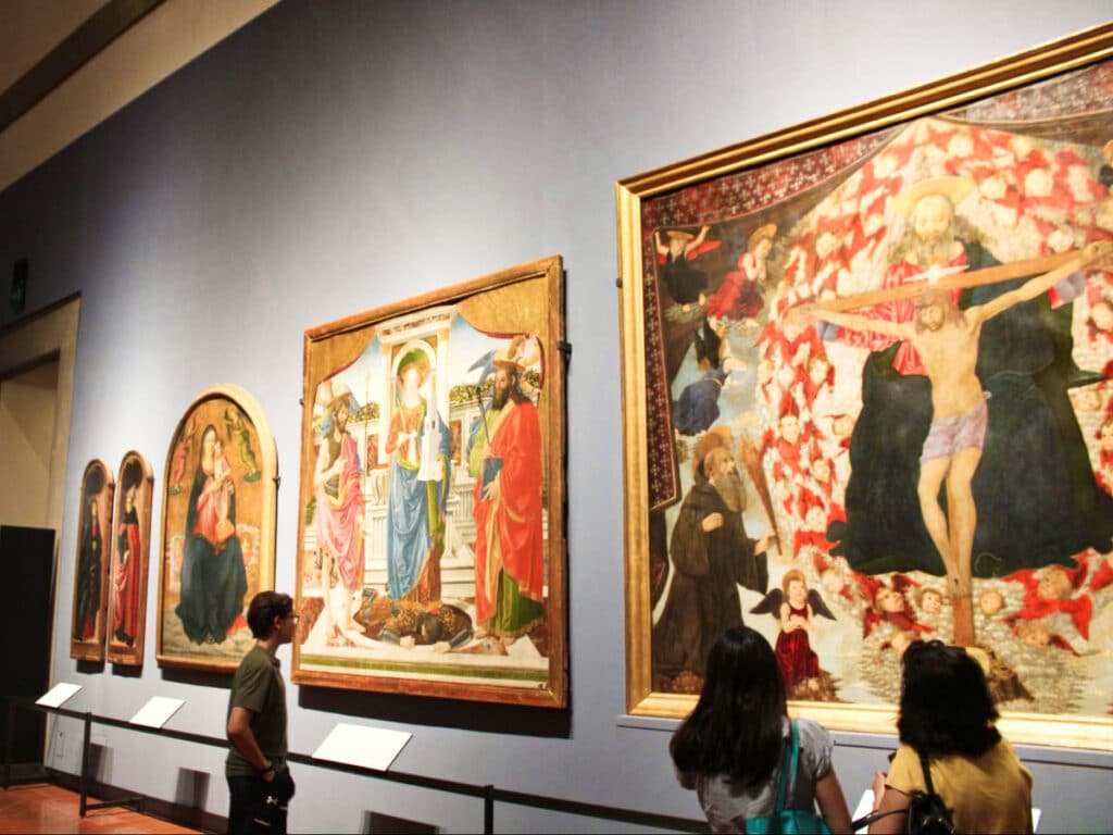 View of the people looking at the artworks inside the museum