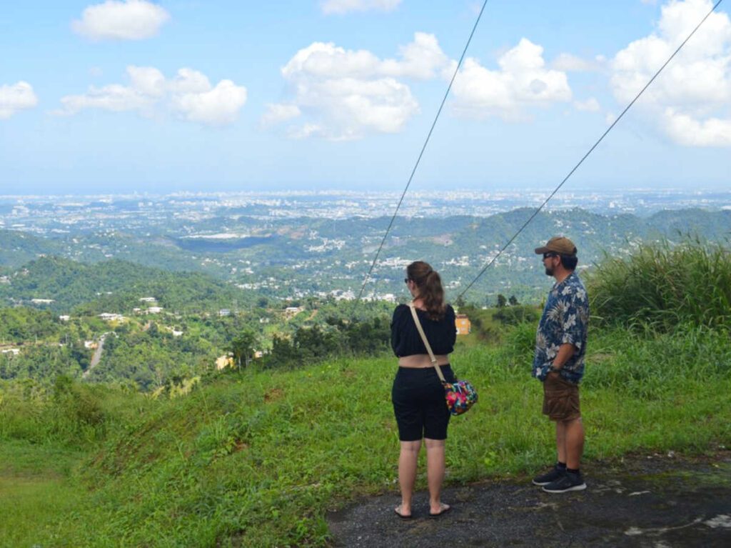 People admiring the overlooking view of San Juan