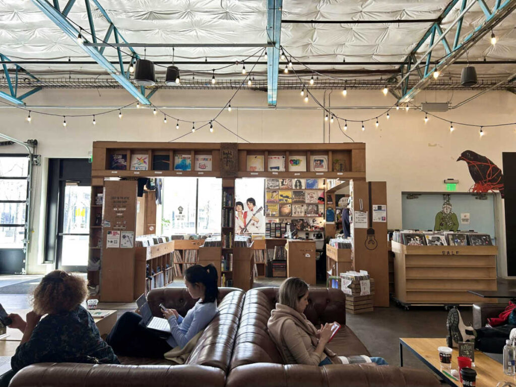 People reading and working inside the KEXP