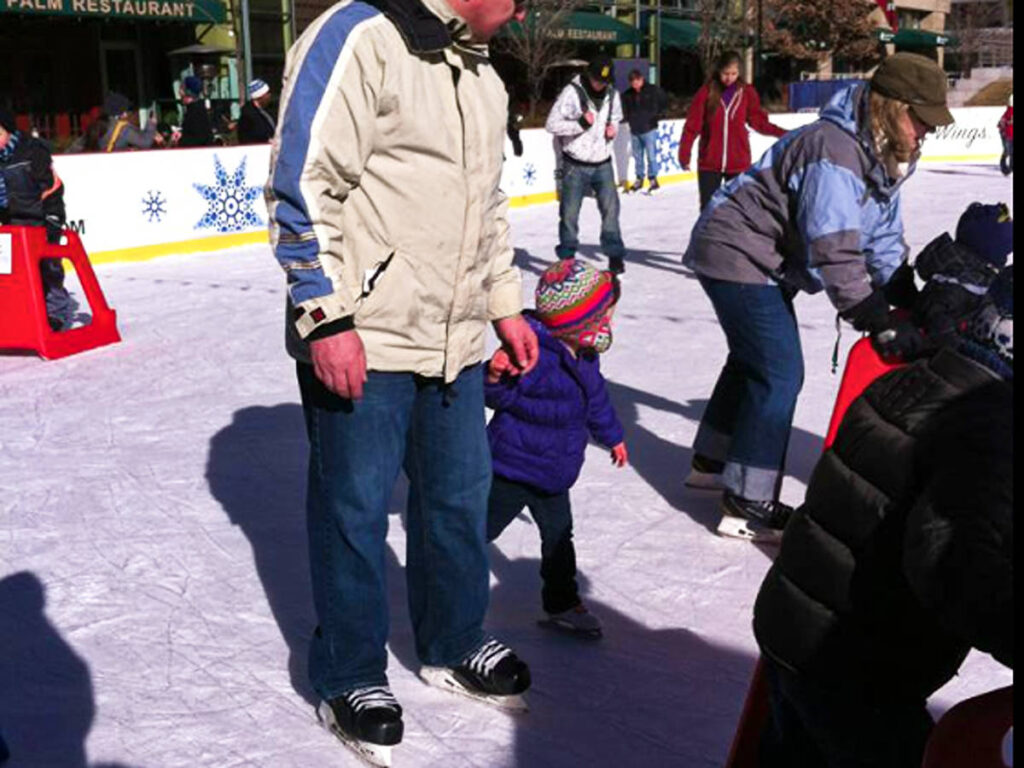 View of the people and a family skating at Skyline Park