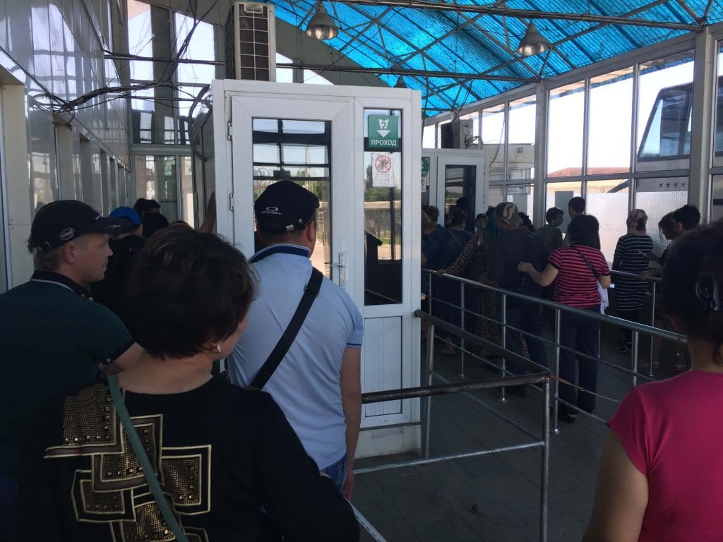 The foreigner standing in line