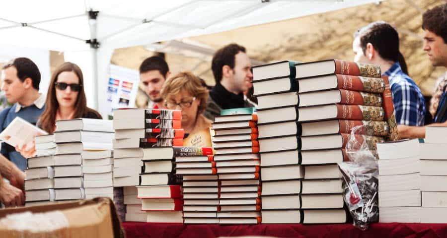 People checking out the displayed books at a book festival