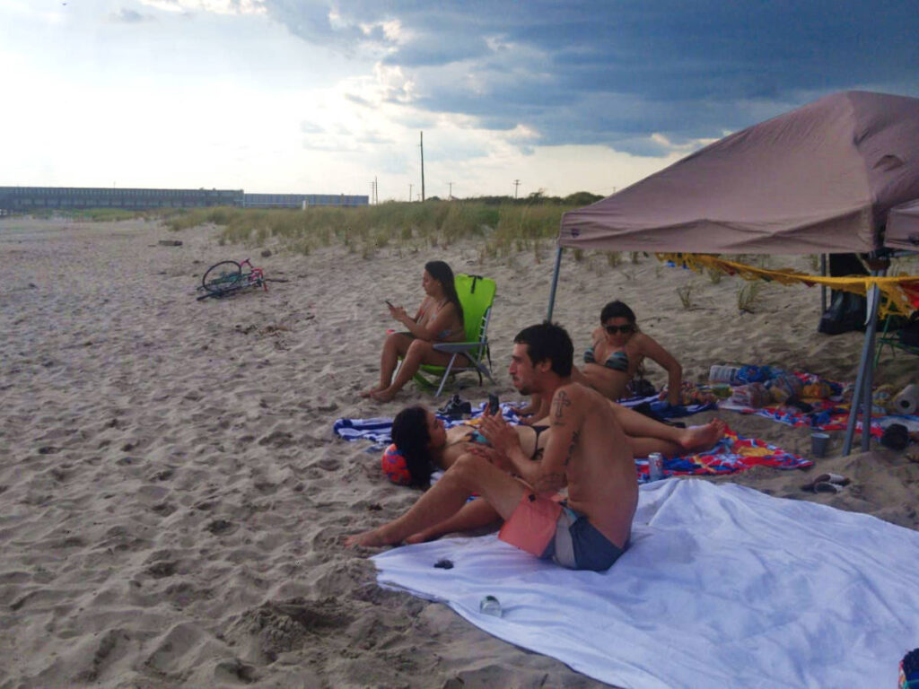 Group of Friends relaxing at the Fort Tilden Beach
