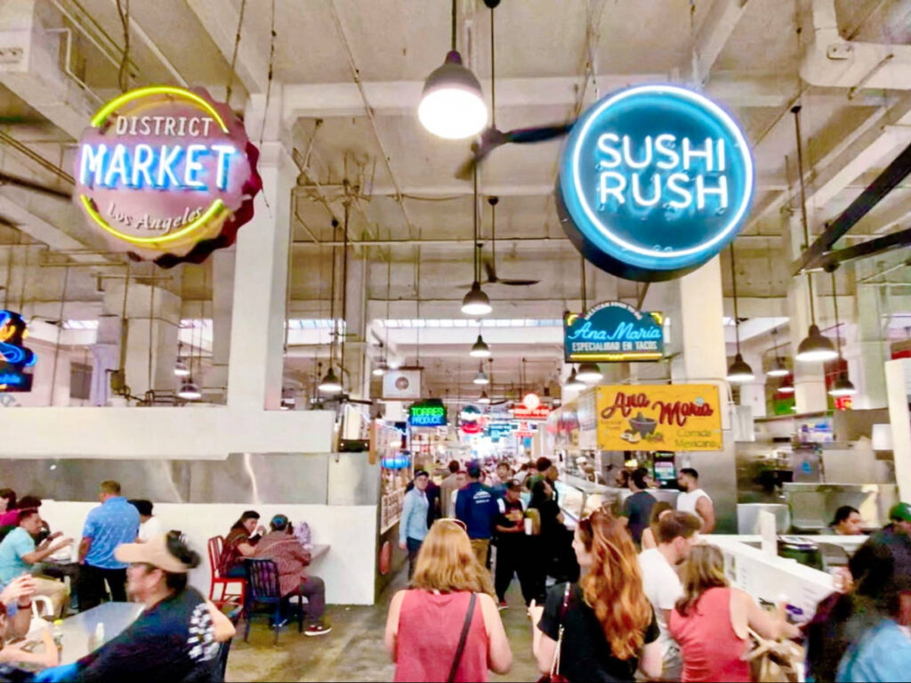 The crowd around the food stalls in the Grand Central Market