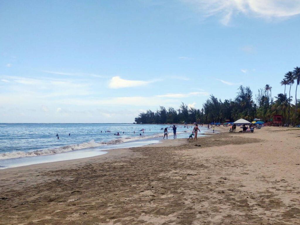 People enjoying their day at the Luquillo Beach in Puerto Rico