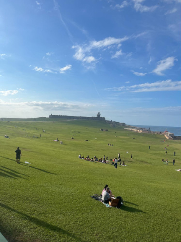 View of people in San Juan National Historic Site during a sunny morning