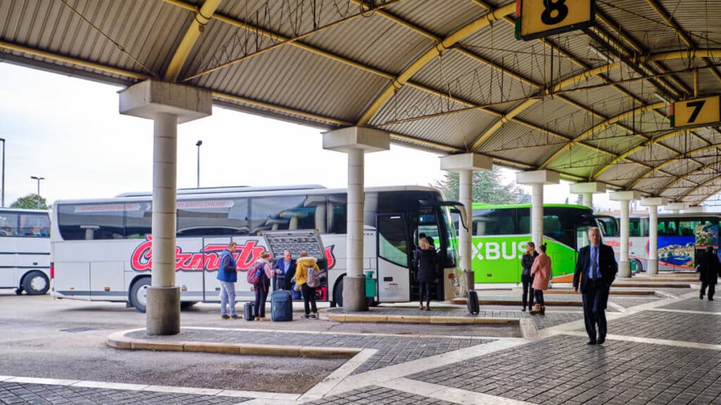 View of the people around the parked bus at the terminal platform 7 & 8 in Zadar