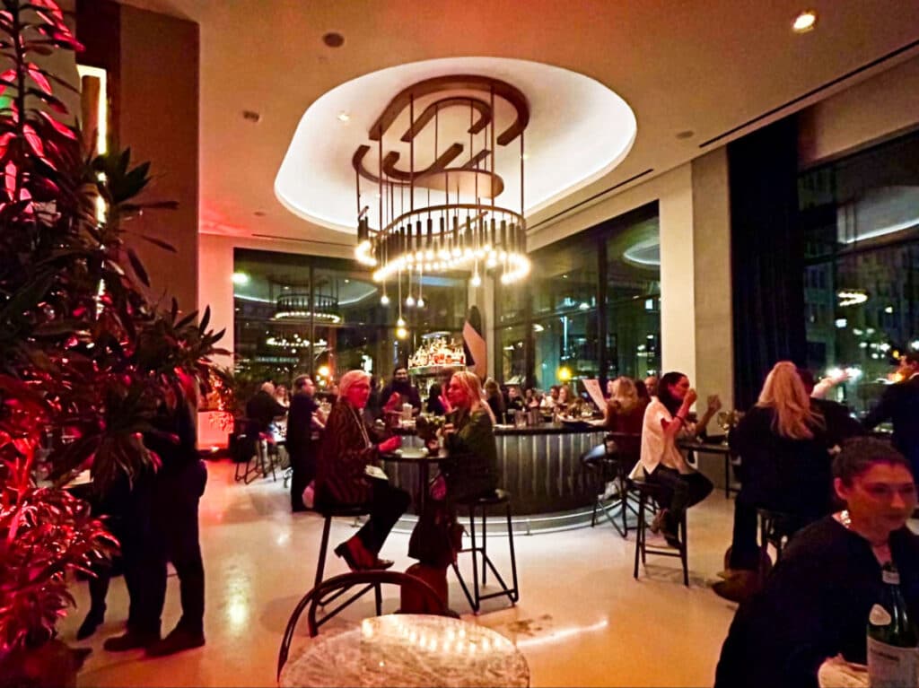 View of people chattering at the lobby of Thompson Denver