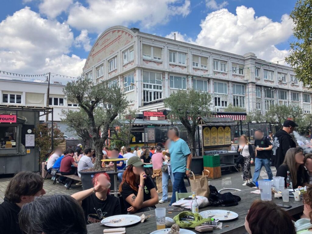 View of people dining outside at the outer districts of Paris