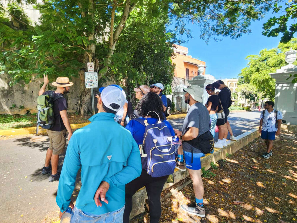 Group of people on a history class in the streets of Old San Juan