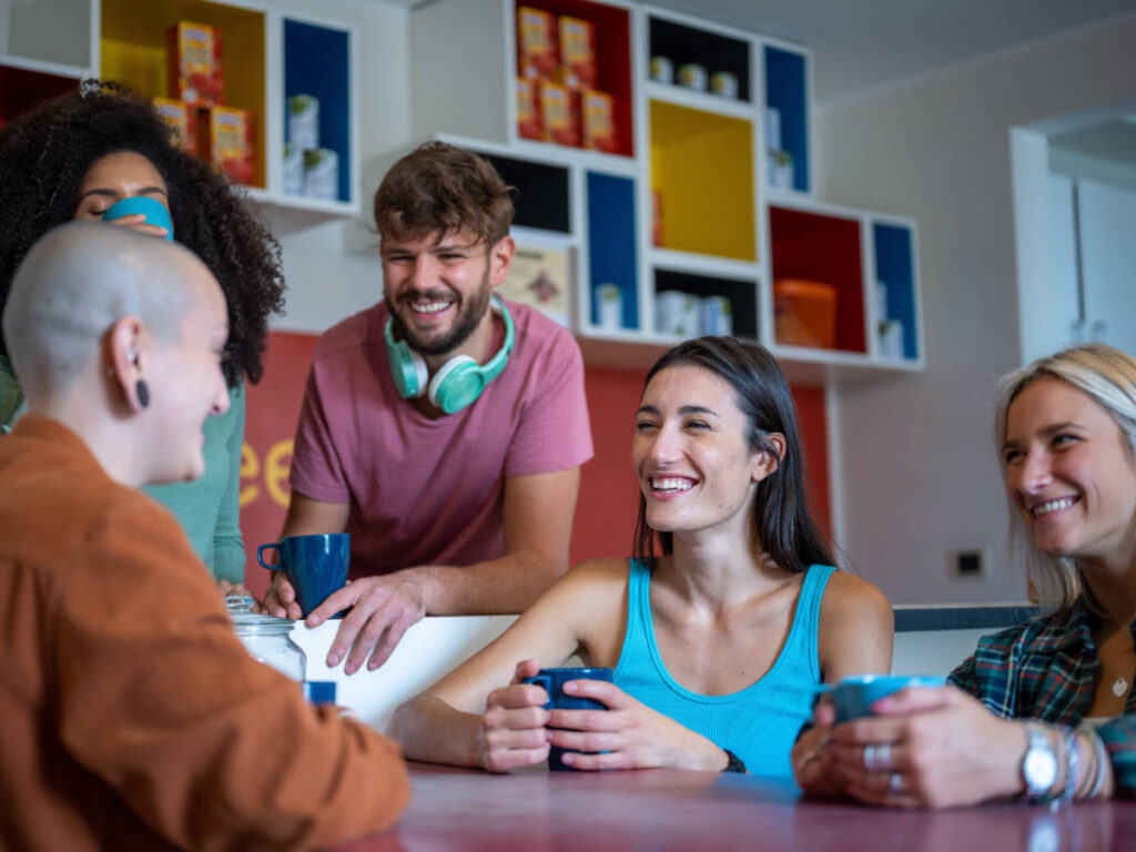 Hostel guests having a fun conversation during their stay