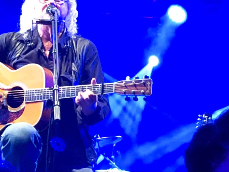 A performer with a guitar at Tipitina’s