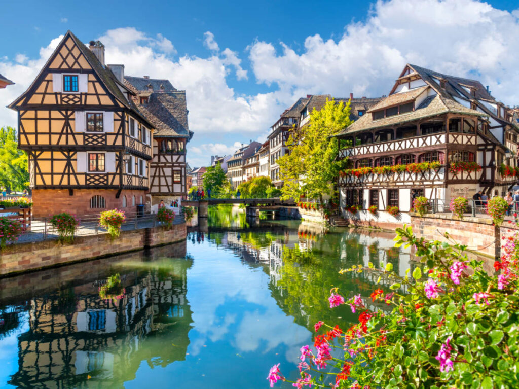 View of Half timbered buildings and the Maison des Tanneurs in the Petite France canal zone along the Ill river