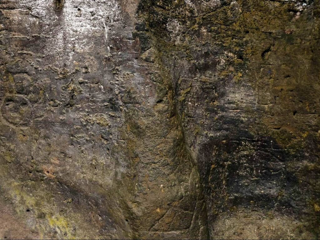 Closeup look of the petroglyphs inside the cave