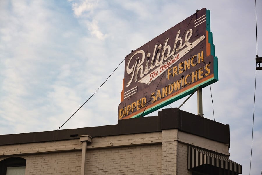 Exterior and neon sign view of Philippe the Original during a gloomy afternoon