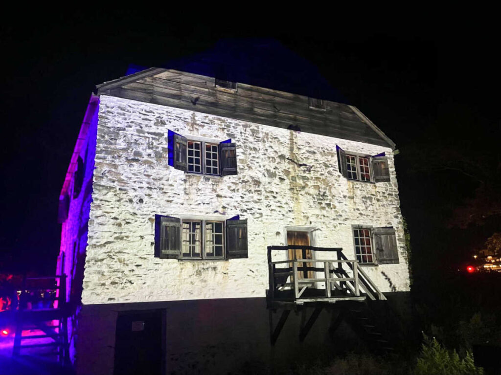 Exterior view of the Philipsburg Manor at night