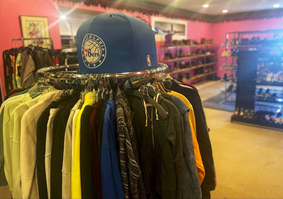 View of clothes and cap at the Philly Aids Thrift