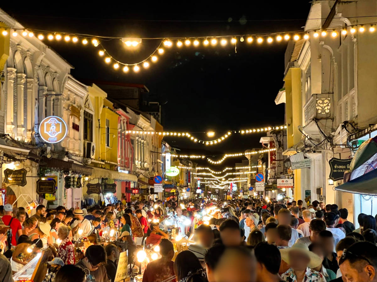 View of the crowd along the Sunday Walking Street Market in Phuket Town at night