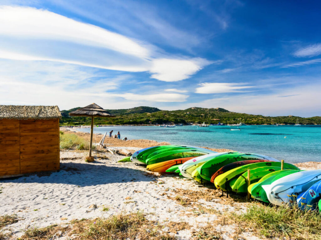 View of the colorful kayak at the shoreline of Piantarella Beach